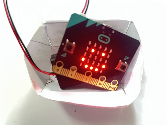 Microbit test pilot showing a happy face
